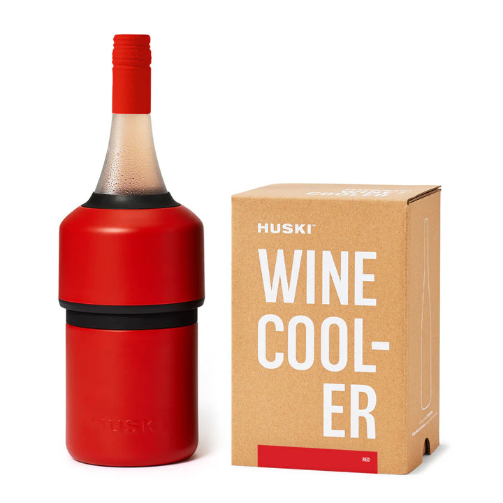 Red Huski Wine Cooler with a bottle inserted next to its packaging on a white background